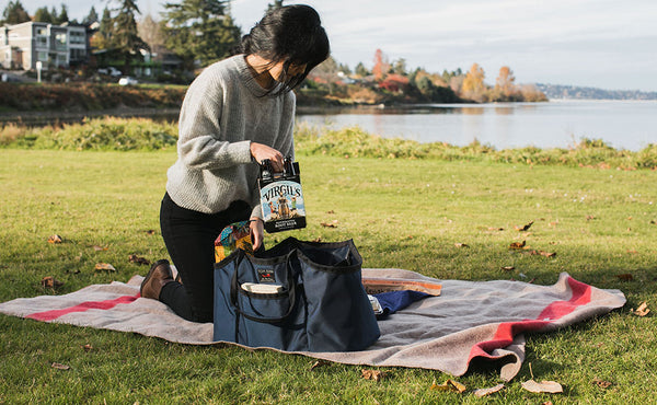 A person setting up a picnic with a Monster Truck.